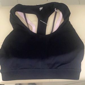Brand new sports bra! Never worn!! Tags still on!!